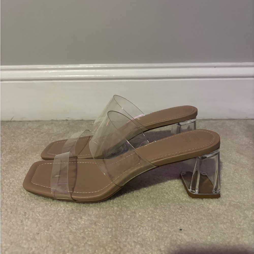 Clear heel  ( will be cleaned prior to shipping )